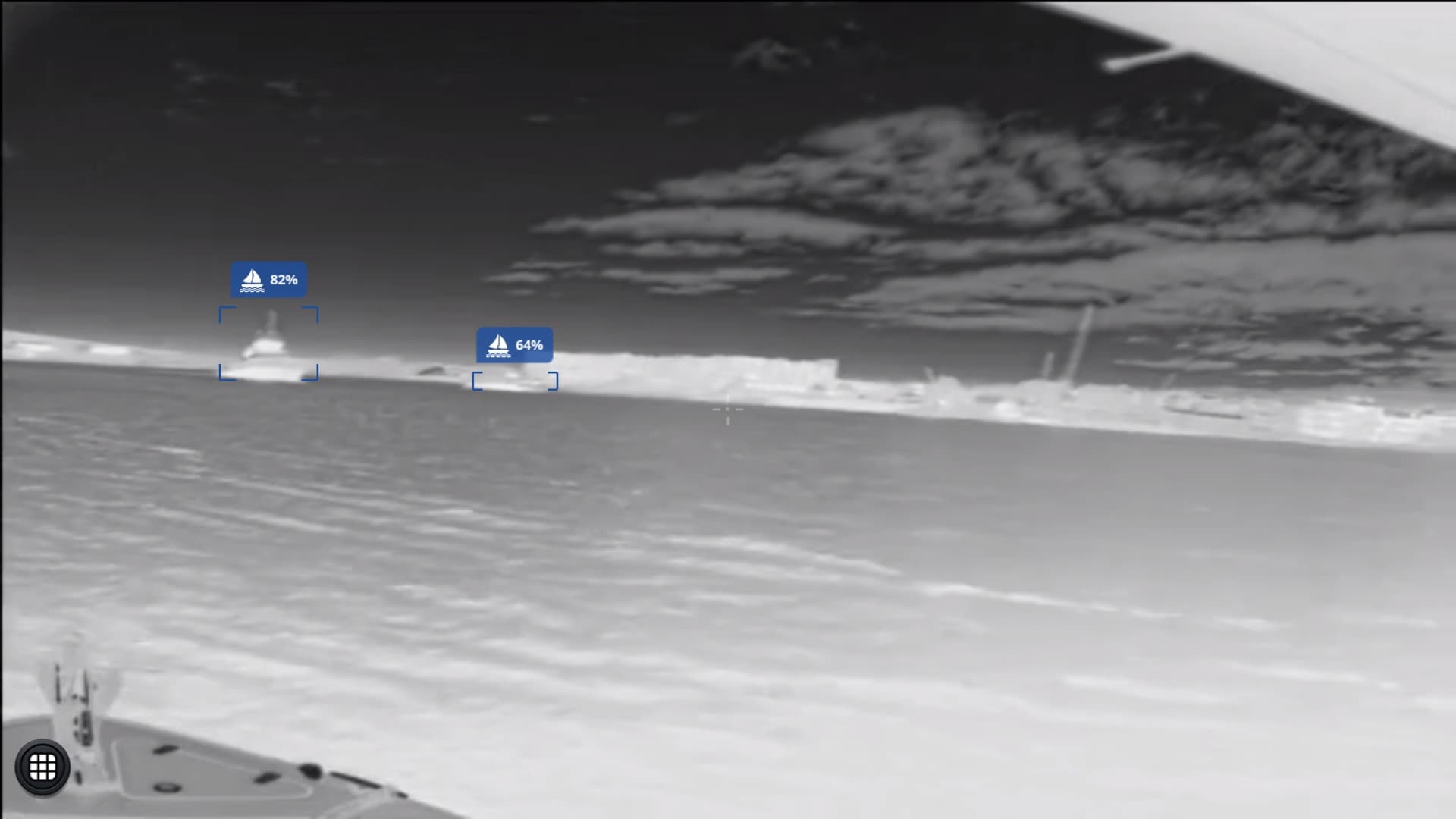 Forward-looking thermal camera feed with AI bounding boxes flagging nearby vessels